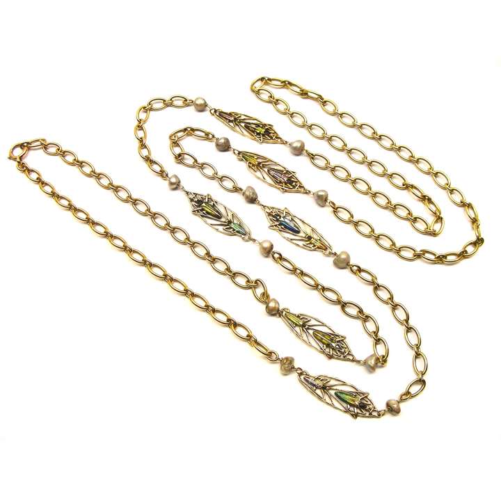 Antique gold long chain with enamel motifs and baroque pearls